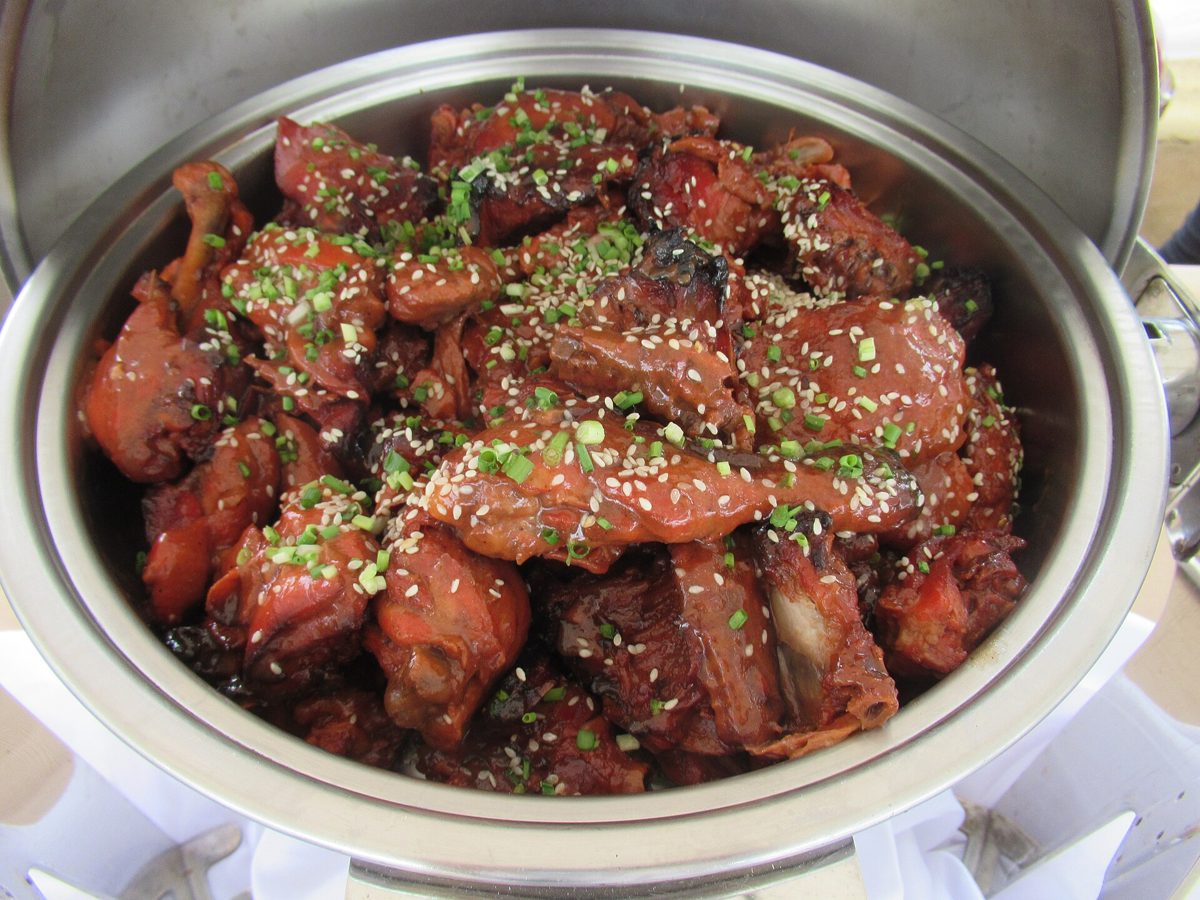 Barbecue chicken over the fire